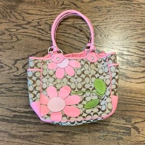 Coach bag with embroidered flowers